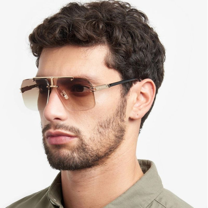 1054/S, Black and Gold/Black Brown Green Gradient Lenses
