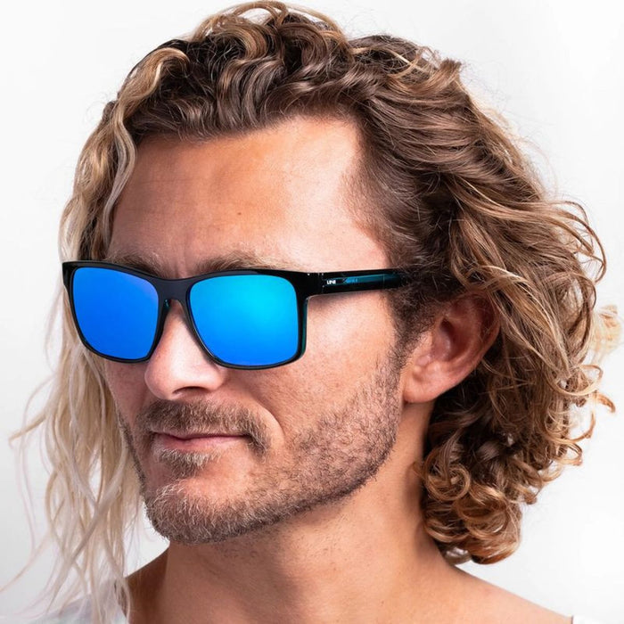Kerrbox, Xtal Neon Black/Blue Mirror Lenses